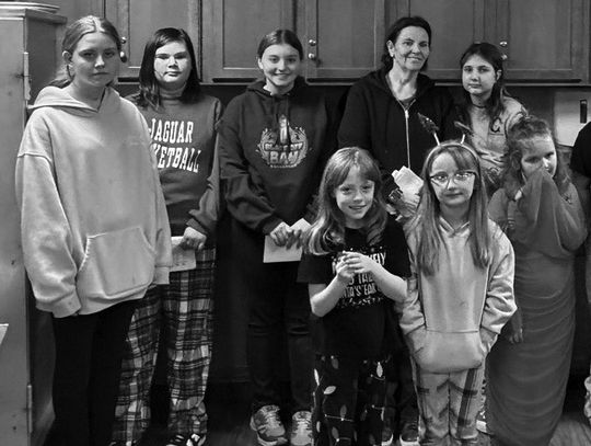 Local Girl Scout Troops Sang Christmas Carols To Residents